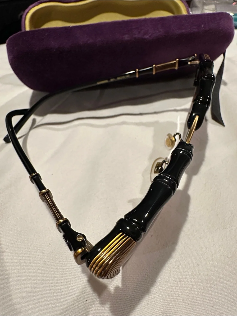 Limited edition Gucci Black Sunglasses with Gold Accents in Yellow & Purple Case